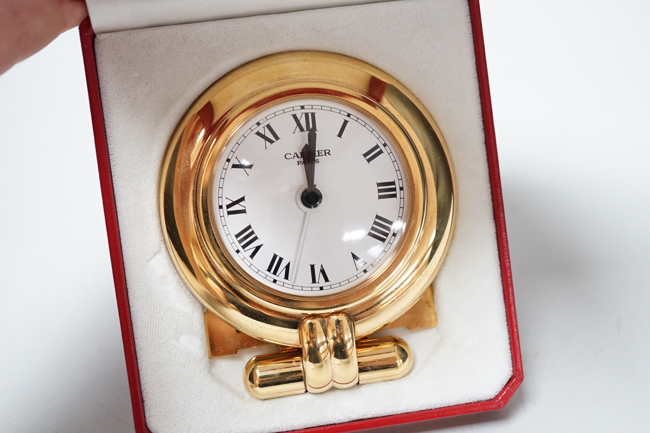 A Cartier travel timepiece, 9cm high, cased